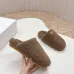 Prada Women’s Beige Sheepskin Slippers – Fuzzy Mules with Gold Logo Tab, Soft Indoor Footwear #A69831