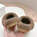 Prada Women’s Beige Sheepskin Slippers – Fuzzy Mules with Gold Logo Tab, Soft Indoor Footwear #A69831