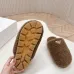 Prada Women’s Beige Sheepskin Slippers – Fuzzy Mules with Gold Logo Tab, Soft Indoor Footwear #A69831