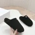 Prada Women’s Black Sheepskin Slippers – Fuzzy Mules with Gold Logo Tab, Soft Indoor Footwear #A69832