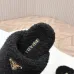 Prada Women’s Black Sheepskin Slippers – Fuzzy Mules with Gold Logo Tab, Soft Indoor Footwear #A69832