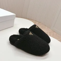 Prada Women’s Black Sheepskin Slippers – Fuzzy Mules with Gold Logo Tab, Soft Indoor Footwear #A69832