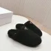 Prada Women’s Black Sheepskin Slippers – Fuzzy Mules with Gold Logo Tab, Soft Indoor Footwear #A69832