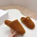 Prada Women’s Brown Sheepskin Slippers – Fuzzy Mules with Gold Triangle Logo Tab, Soft Indoor Footwear #A69833