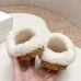 Prada Women’s White Sheepskin Slippers – Fuzzy Mules with Gold Triangle Logo Tab, Soft Indoor Footwear #A69834